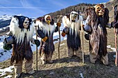 Switzerland, Valais, Lotschental valley, Wiler, Tschaggatta Carnival, costumes are made from animal skins, wooden masks and horse hair