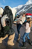 Switzerland, Valais, Lotschental valley, Wiler, Tschaggatta Carnival, costumes are made from animal skins, wooden masks and horse hair