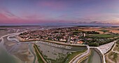 France, Somme, Baie de Somme, Le Crotoy, Sunrise over the Crotoy and the Baie de Somme at low tide (aerial view)