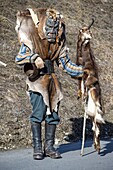 Switzerland, Valais, Lotschental valley, Wiler, Tschaggatta Carnival, costumes are made from animal skins, wooden masks and horse hair