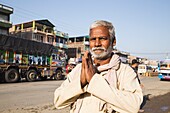 Nepal, Chitwan, Ratnanagar, man near the road