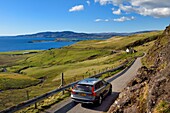 United Kingdom, Scotland, Highland, Inner Hebrides, Isle of Mull west coast, narrow coastal road towards Balmeanach