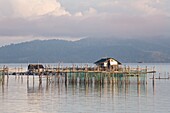 Philippines, Palawan, Malampaya Sound Protected Landscape and Seascape, typical fishing gear with a bamboo structure maintaining fish nets