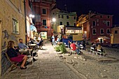 Italy, Liguria, Genoa, Boccadasse, small port and beach of Boccadasse, terrace of the cafe La Strambata in the port of Boccadasse