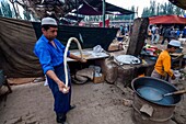 China, Xinjiang autonomous region, Kashgar, livestock market, noodle restaurant