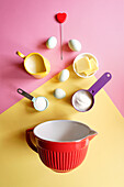 Modern Baking Concept Flatlay with Retro Pink and Yellow Color Blocking Aesthetic.