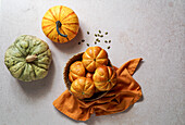 Pumpkin roll yeast bread with spices on linen background. Thanksgiving food concept. Autumn concept,top view,Halloween