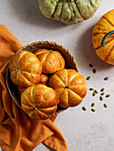 Pumpkin roll yeast bread with spices on a linen background. Thanksgiving food concept. Autumn concept,top view,Halloween