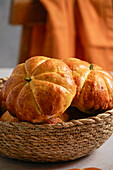 Pumpkin roll yeast bread with spices on linen background. Thanksgiving food concept. Autumn concept,top view,Halloween
