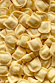 Background of homemade Italian ravioli. View from above