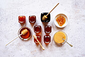 Selection of Australian honey, including Yellowbox, Ironbark, Macadamia, Rainforest, Tea Tree, Manuka, Creamed Honey and Honeycomb.