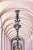 Portugal, Lisbon. An outdoor arched passageway at the Supreme Court.