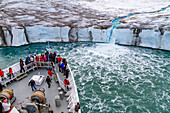 The Lindblad Expedition ship National Geographic Explorer near glacial run-off in the Svalbard Archipelago, Norway, Arctic, Europe