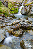 Views of a waterfall in Fortuna Bay on the northern coast of South Georgia, Southern Ocean, Polar Regions