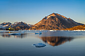 Fishing trawler in the mountainous fjord, Kulusuk, Greenland, Denmark, Polar Regions