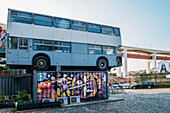 Village Underground Lisboa, an international platform for creativity, art, and culture, built with two buses and 14 shipping containers converted into creative spaces, Lisbon, Portugal, Europe