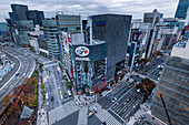 Aerial view of big Intersection in Ginza, looking over the streets and skyscraper facades, Tokyo, Honshu, Japan, Asia