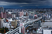 Blick vom Tsutenkaku-Turm im Shinsekai-Viertel auf die Skyline der Stadt,Osaka,Honshu,Japan,Asien