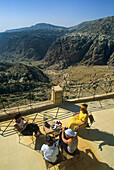 Women on a terrace above the Dana Valley, Jordan, Middle East