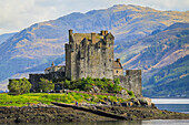 Picturesque 13th century Eilean Donan Castle on a tidal island by the Kyle of Loch Alsh, Eilean Donan, Dornie, Kyle of Loch Alsh, West Highlands, Scotland, United Kingdom, Europe