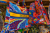 View of colourful bags in shop near Aragonese Castle, Port of Ischia, Island of Ischia, Campania, Italy, Europe