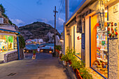 View of shops and town in Sant'Angelo at dusk, Sant'Angelo, Island of Ischia, Campania, Italy, Europe