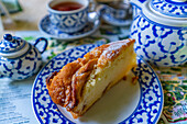 View of tea and cake in Giardini la Mortella cafe, Forio, Island of Ischia, Campania, Italy, Europe