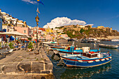 View of restaurants and fishing boats in Marina di Corricella, Procida, Phlegraean Islands, Gulf of Naples, Campania, Southern Italy, Italy, Europe