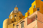 View of colourful buildings and Church of Santa Maria delle Grazie, Procida, Phlegraean Islands, Gulf of Naples, Campania, Southern Italy, Italy, Europe