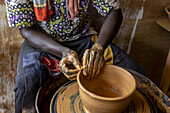 Potter at work in Kpalime, Togo, West Africa, Africa