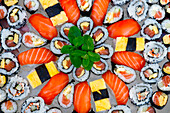 Different Japanese rolls and sushi on a plate, Japanese food, France, Europe