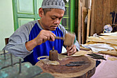 Workshop of puppets for shadow play (wayang kulit), Bima Art Shadow Puppet Maker, Sondakan district, Solo (Surakarta), Java island, Indonesia, Southeast Asia, Asia