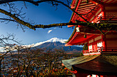 Mount Fujiyama (Mount Fuji), UNESCO World Heritage Site, iconic volcano in autumn with red pagaoda framing the summit, Honshu, Japan, Asia