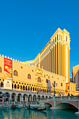 Gondola rides in canal The Venetian Las Vegas Hotel at sunset, Las Vegas Strip, Paradise, Las Vegas Boulevard, Las Vegas, Nevada, United States of America, North America