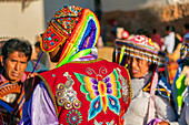 Back view of Peruvian man in traditional dress on celebration, Chinchero, Peru, South America