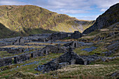 The abandoned Rhosydd Slate Quarry backed by Cwmorthin and Allt y Ceffylau, Moelwyn Mountains, Snowdonia National Park (Eryri), North Wales, United Kingdom, Europe