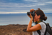 Guest from the Lindblad Expedition ship National Geographic Endeavour in the Galapagos Islands, UNESCO World Heritage Site, Ecuador, South America