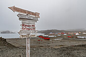 View signpost at Base Presidente Eduardo Frei Montalva, Antarctica, Southern Ocean, Polar Regions