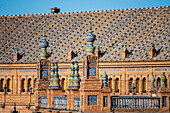 Close up view of the ornate architectural features of Plaza de Espana in Seville, Spain, showcasing historic design and intricate details. A stunning example of Spanish architecture.