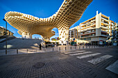 Seville, Spain, Jan 28 2021, Captivating view of Las Setas, a modern architectural masterpiece in Seville, Spain. The structure's intricate design is highlighted by a clear blue sky.