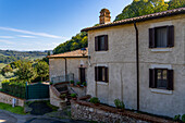 A hotel in a traditional building in the borga or medieval hilltop town of Farfa, Italy.