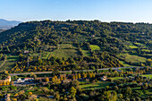 A veiw of olive orchards and grape vineyards in the Umbrian countryside from the hilltop town of Orvieto, Italy.