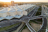 Aerial view of Zaragoza–Delicias railway and central bus station at sunset