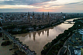 Aerial view of El Pilar Basilica Cathedral and the Ebro River at sunset, Zaragoza, Spain