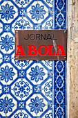 Lisbon, Portugal, March 1 2007, A striking plaque of Jornal A Bola stands out against traditional azulejo tiles in Bairro Alto, showcasing Lisbon's rich cultural heritage.