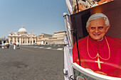 Rome, Italy, July 22 2017, Postcards showcasing Pope Benedict XVI stand in St. Peter's Square, capturing the essence of Vatican City and its spiritual significance.