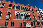 Rear facade of the historic Hotel Danieli on the Riva degli Schivoni quayside promenade in Venice, Italy.