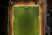 Aerial view of a training in a soccer field at night