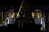 View of the Parque Berrio metro station inMedellin, Colombia. The metro includes street level trains and even aerial cable cars to connectthe city's downtown to the poorer neighborhoods in the surrounding mountains.