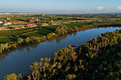 Aerial view of the Ebro River passing by La Alfranca area in Zaragoza, Spain